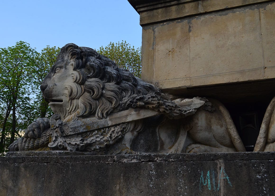 Obelisk with lions